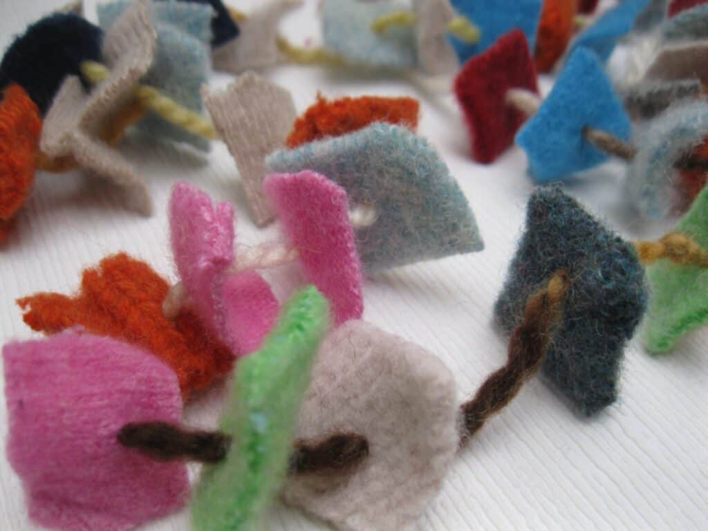 Learn about crafting with felted sweaters and show your kids how to transform old wool sweaters into unique, handmade creations.